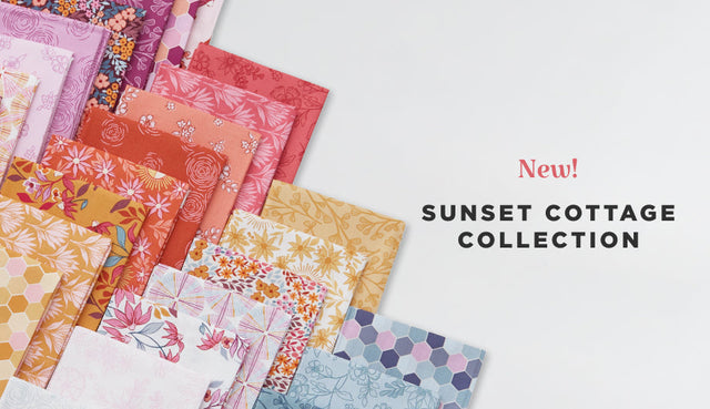 Quilting fabric of a fat quarter bundle featuring flowers, hexagons, and other botanical prints..