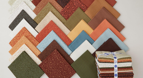 Fat quarter bundle of monochromatic gingham and leaf prints in a warm colorway.