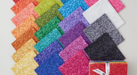 a selection of fat quarter fabrics from the Fairy Rings fabric collection.