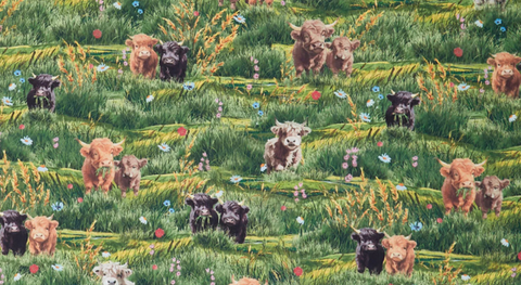 fabric by the yard featuring charming highland cattle in grassy fields.