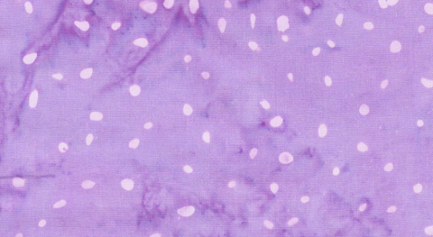 Batik with light lavender speckles on a lavender background.