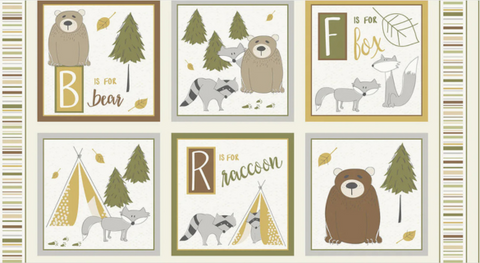 Quilt panel of woodland-themed squares in shades of brown, green, gray, yellow, and cream from the Into The Woodlands Fabric Collection. 