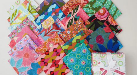 A selection of fat quarter prints from the Jumpstart fabric collection by Anna Maria Parry.