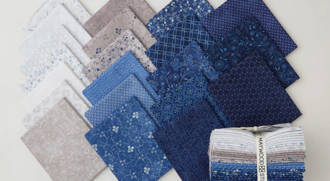 a selection of fat quarter fabric prints from the patchwork blue fabric collection.