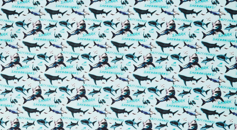 A shark fabric print from the Shark Week fabric collection.